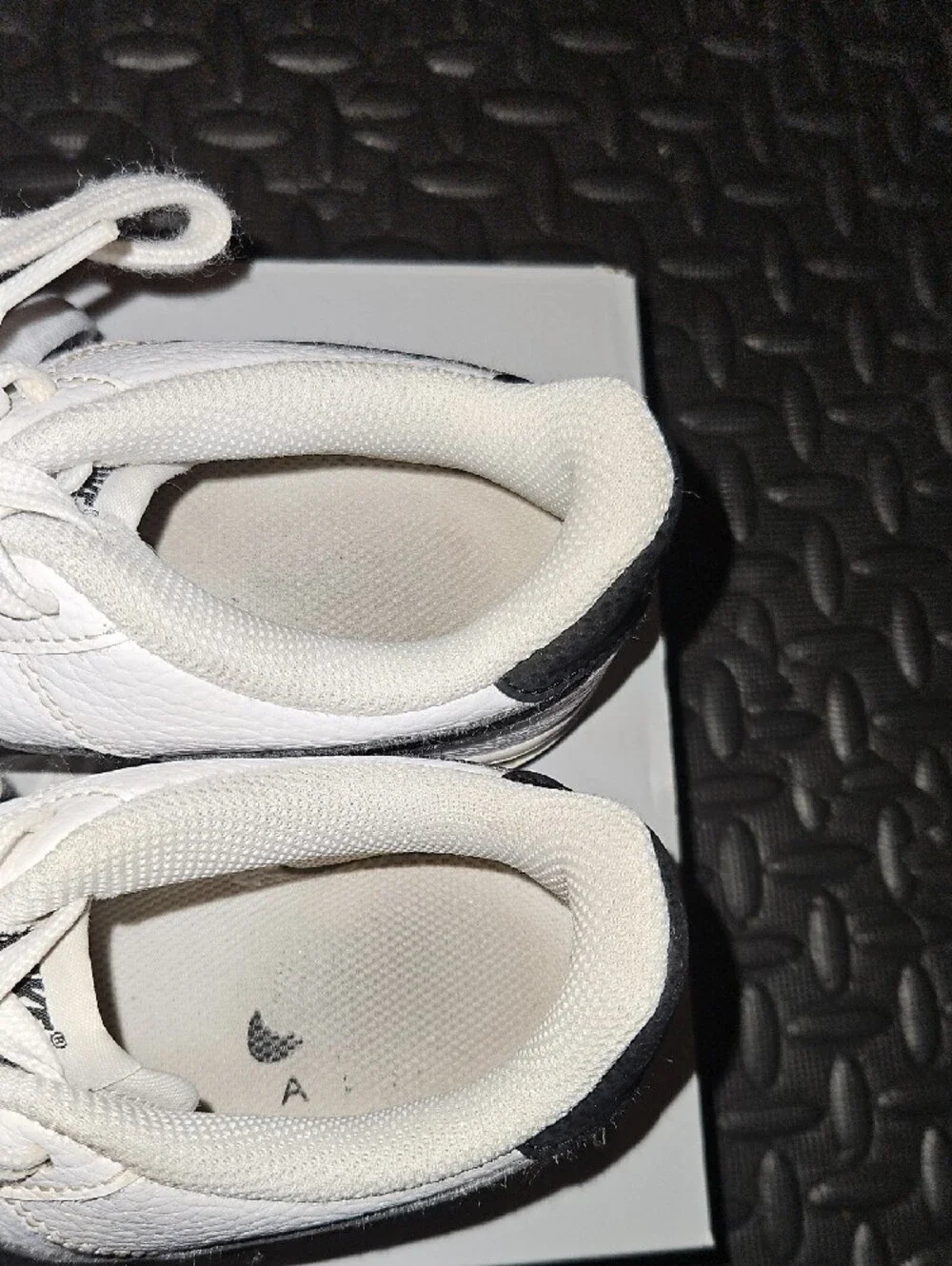 Nike White Sneakers with Black Swoosh